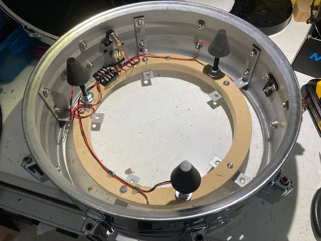 DIY 3 cone trigger. VERY sensitive, full dynamic range. Mild hot spotting over each trigger but you almost never hit there unless heavy drinking is involved.